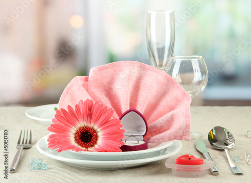 Photo: Table serving on bright background Table serving on bright background