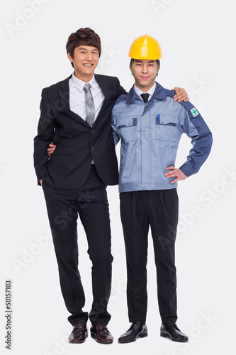 Photo: Business man and engineer. Business man and engineer.