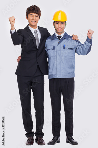 Photo: Business man and engineer. Business man and engineer.