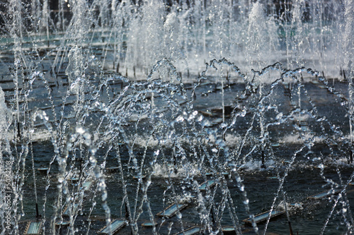 Photo: Fountain water jets in park Fountain water jets in park