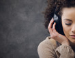 Photo: young woman enjoying music young woman enjoying music