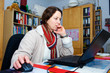 woman is working in the home- office