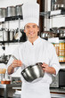 Male Chef With Wire Whisk And Mixing Bowl