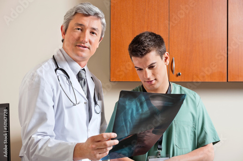 Photo: Radiologist Standing With Male Technician Radiologist Standing With Male Technician