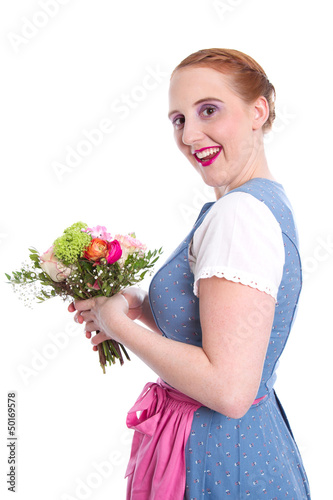 Photo: Glückliche Frau mit Blumen - isoliert - im Dirndlkleid Glückliche Frau mit Blumen - isoliert - im Dirndlkleid