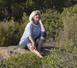 relaxed gray hair woman enjoying nature and sun