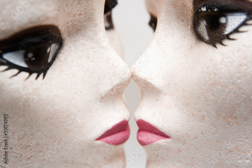 Photo: Female mannequin heads kissing Female mannequin heads kissing