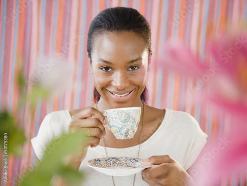 Photo: Black woman drinking tea Black woman drinking tea