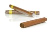 Photo: A group of cigars on a white background A group of cigars on a white background