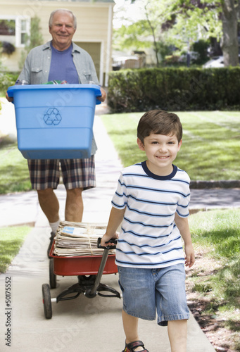 Photo: Caucasian grandfather and grandson recycling Caucasian grandfather and grandson recycling