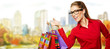 Woman with Shopping Bags, outdoors.