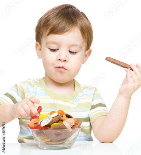 Photo: Portrait of a boy with cookies Portrait of a boy with cookies