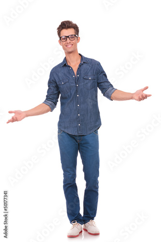 Photo: man welcomes you open handed man welcomes you open handed