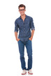 young man with hands in pockets