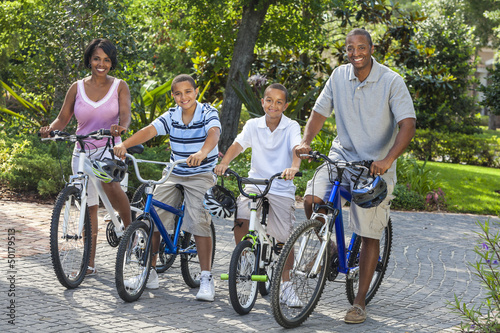 Photo: African American Parents Boy Children Riding Bikes African American Parents Boy Children Riding Bikes