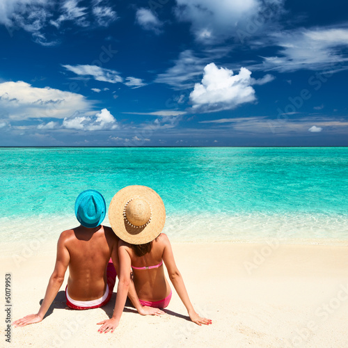 Photo: Couple on a beach at Maldives Couple on a beach at Maldives