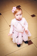 Portrait Baby dressed in pink dress