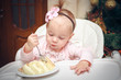 Little girl with a sweet cake in birthday
