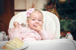 Little girl with a sweet cake in birthday