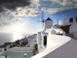 Windmill in Santorini against sunset, Greece