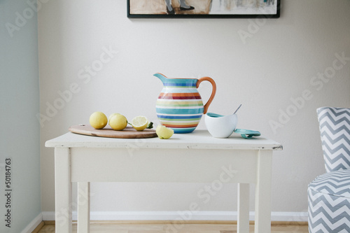Photo: Pitcher, cutting board and lemons Pitcher, cutting board and lemons