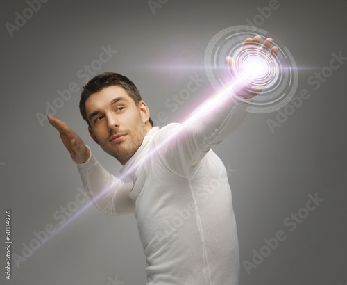 Photo: man working with virtual screen man working with virtual screen