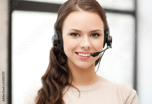 Photo: friendly female helpline operator friendly female helpline operator