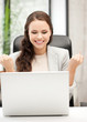 smiling businesswoman celebrating victory or win