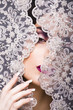 portrait of beauty young woman through lace
