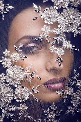 Photo: portrait of beauty young woman through lace portrait of beauty young woman through lace