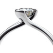 Wedding ring with diamond on white background. Sign of love
