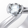 Wedding ring with diamond on white background. Sign of love