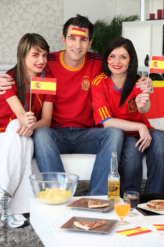 Photo: Group of friends supporting the Spanish football team Group of friends supporting the Spanish football team