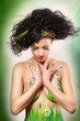 girl with drawings on the body in an image of summer