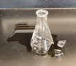 Broken flask on a lab bench
