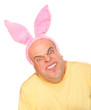An successful man with rabbit ears.