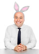 An successful man with rabbit ears.