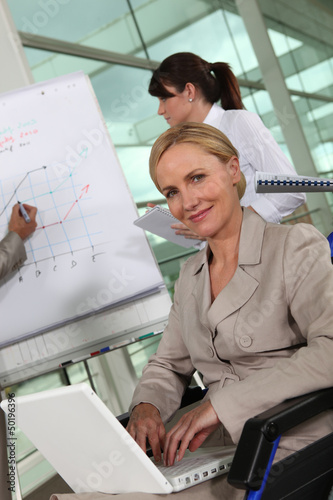 Photo: businesswoman in wheelchair businesswoman in wheelchair