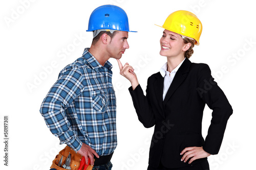Photo: Architect flirting with builder Architect flirting with builder