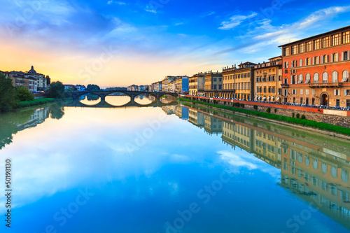 Photo: Florence, carraia medieval bridge on Arno river on sunset Florence, carraia medieval bridge on Arno river on sunset