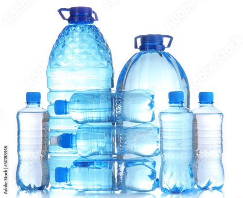 Photo: Different water bottles isolated on white Different water bottles isolated on white