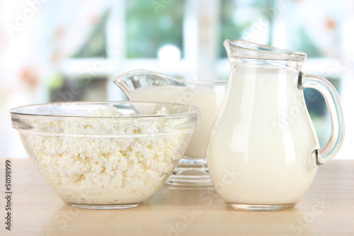 Photo: Dairy products on table in kitchen Dairy products on table in kitchen