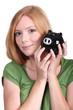 young woman with money box