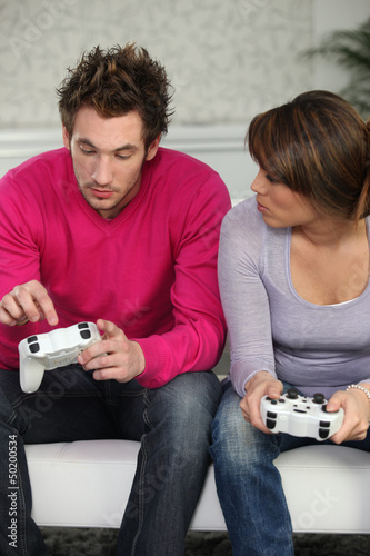 Photo: Couple with console control Couple with console control