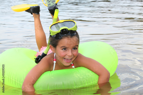 Photo: Young girl learning to snorkel Young girl learning to snorkel