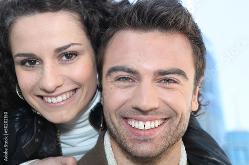 Photo: Closeup of a smiling couple Closeup of a smiling couple
