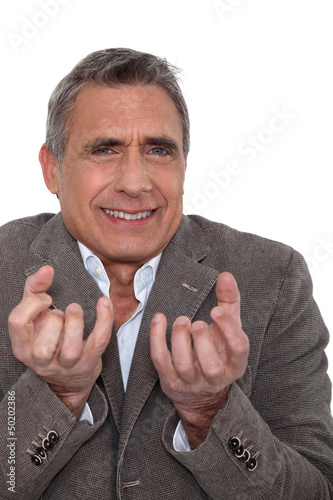 Photo: Middle aged businessman. Middle aged businessman.