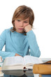 Photo: A bored child studying A bored child studying