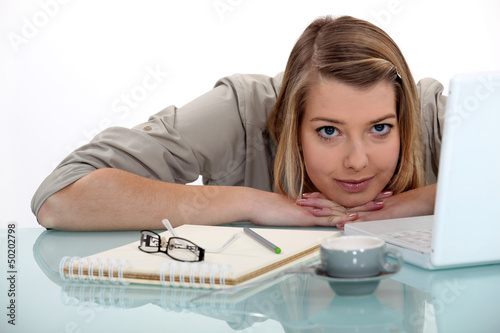 Photo: Woman lying on a table Woman lying on a table