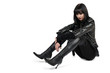 Portrait of young goth woman in lace-up boots